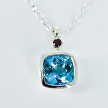 Load image into Gallery viewer, Blue Topaz and Garnet Pendant Ai305