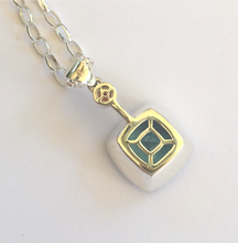 Load image into Gallery viewer, Blue Topaz and Garnet Pendant Ai305