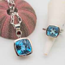 Load image into Gallery viewer, Blue Topaz and Garnet Pendant Ai305