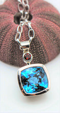 Load image into Gallery viewer, Blue Topaz and Garnet Pendant Ai305